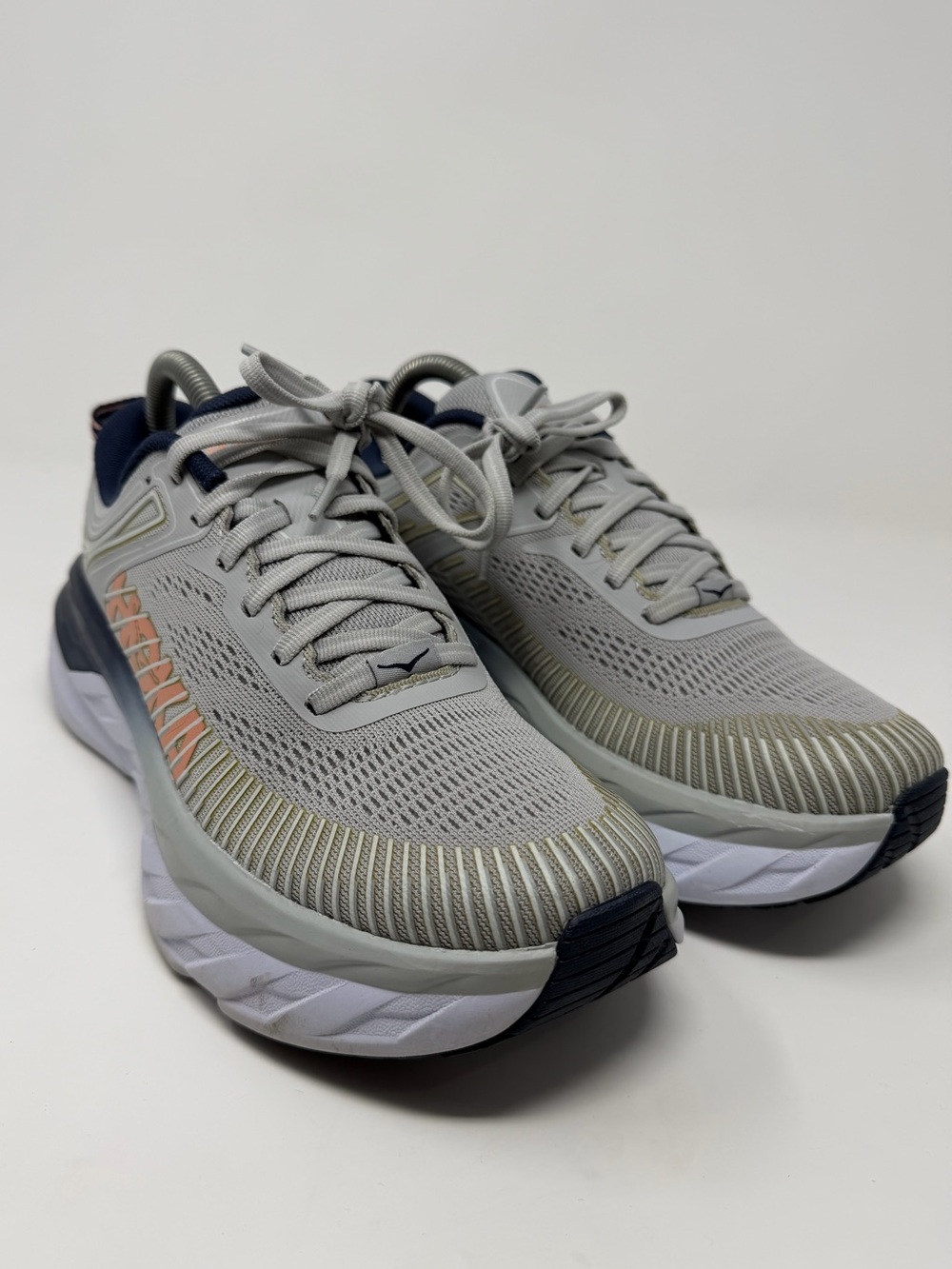 Women’s Hoka Bondi 7 in grey, navy and coral accents sz. 7.5